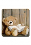 interrupteur nounours endormi sur un livre